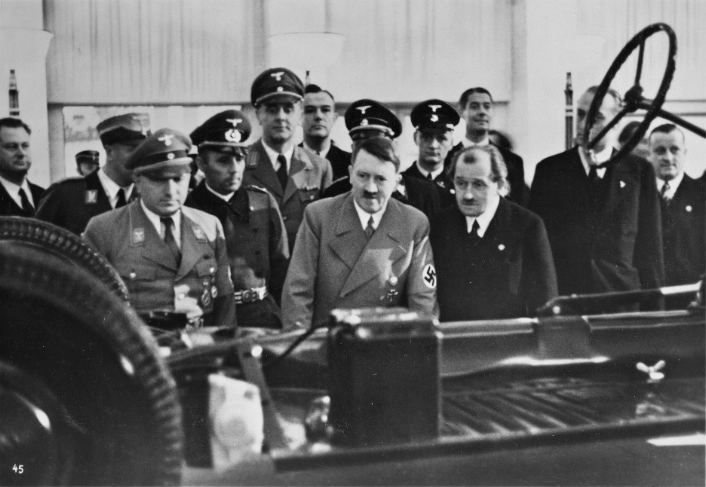 Adolf Hitler with Ferdinand Porsche and Robert Ley at the Volkswagen booth of the International Motor Show in Berlin 